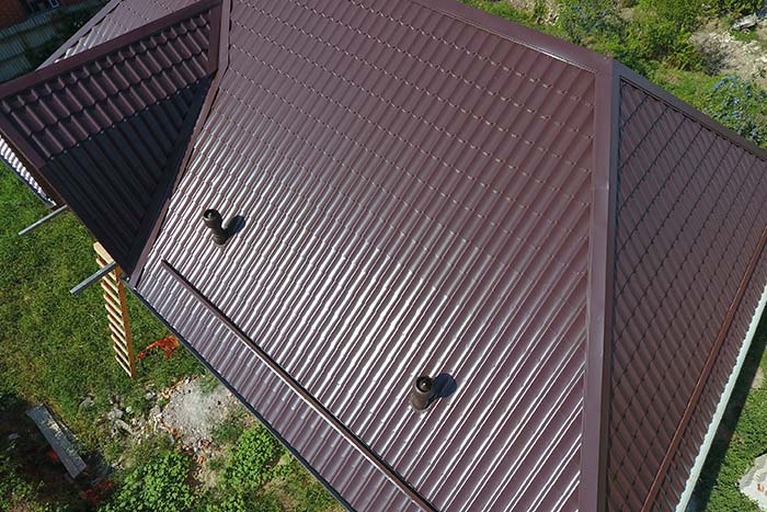 Aerial view of brown metal roof on home in Denver
